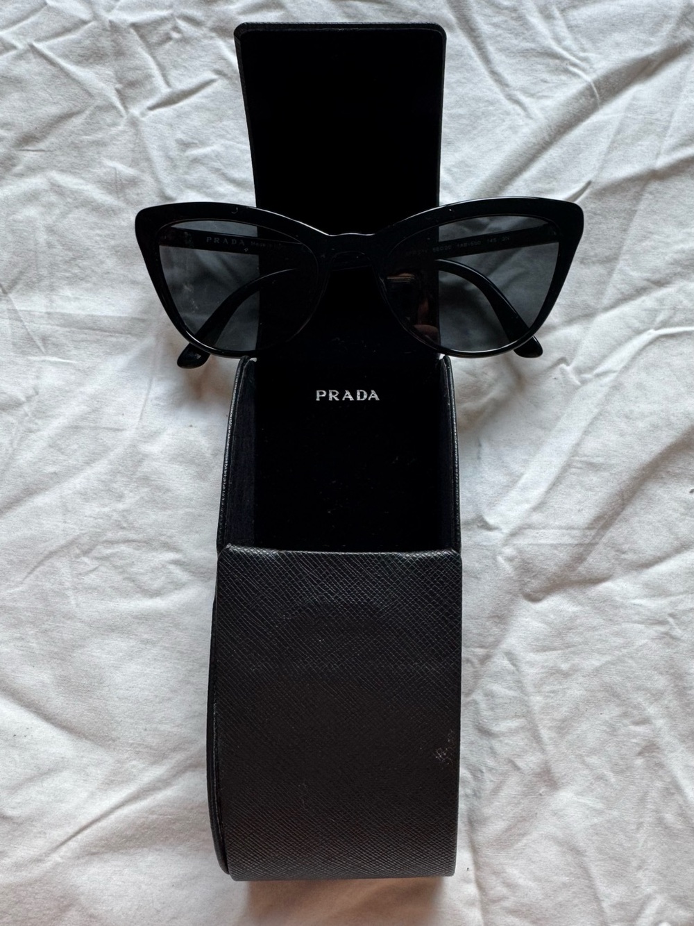 Prada Black Cat-Eye Sunglasses with Dark Lenses